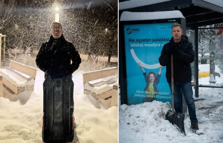 Férfi hóesésben áll, fekete kabátban, síléccel a hóban, hideg téli estében.